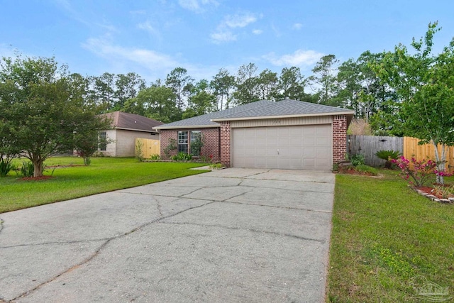 208 Millet Cir, Cantonment, FL 32533 - ranch-style home with fence, concrete driveway, brick siding, and a garage