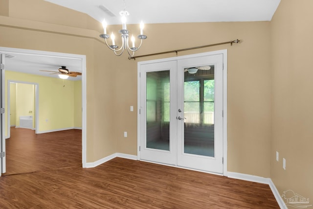 208 Millet Cir, Cantonment, FL 32533 - spare room with baseboards, dark wood-style flooring, french doors, and vaulted ceiling