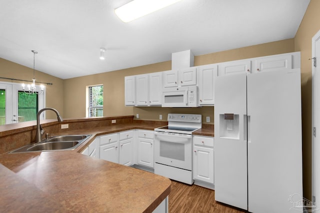 208 Millet Cir, Cantonment, FL 32533 - kitchen featuring white appliances, white cabinets, a sink, light wood-type flooring, and lofted ceiling