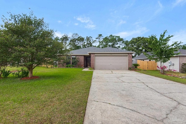 208 Millet Cir, Cantonment, FL 32533 - ranch-style home featuring driveway, a front yard, fence, brick siding, and a garage