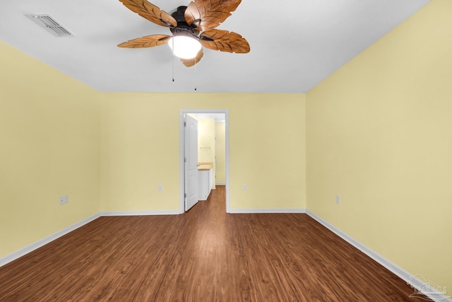 208 Millet Cir, Cantonment, FL 32533 - empty room with wood finished floors, visible vents, a ceiling fan, and baseboards