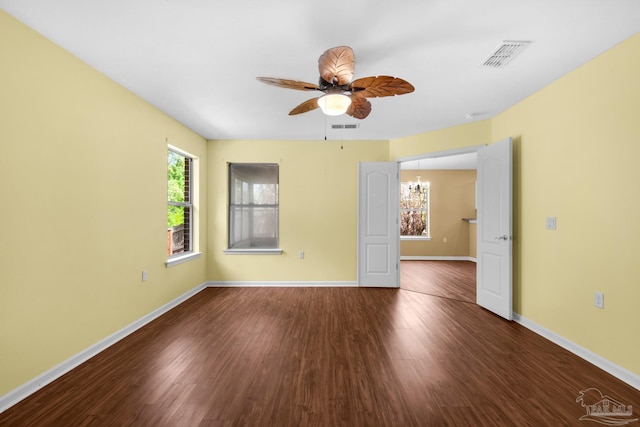 208 Millet Cir, Cantonment, FL 32533 - unfurnished room featuring baseboards, visible vents, wood finished floors, and a ceiling fan