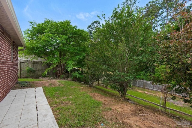 208 Millet Cir, Cantonment, FL 32533 - view of yard with a fenced backyard