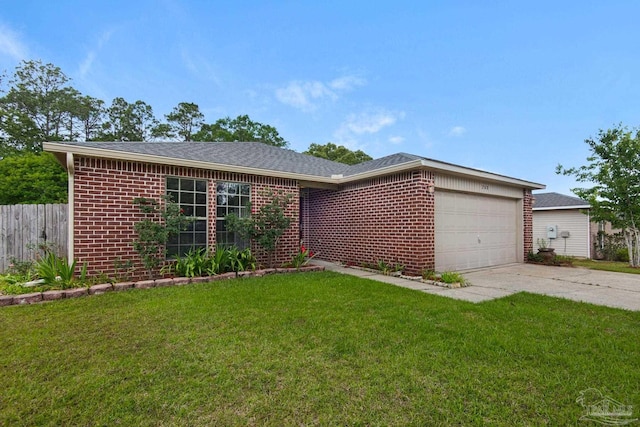 208 Millet Cir, Cantonment, FL 32533 - single story home featuring a front lawn, driveway, brick siding, an attached garage, and fence