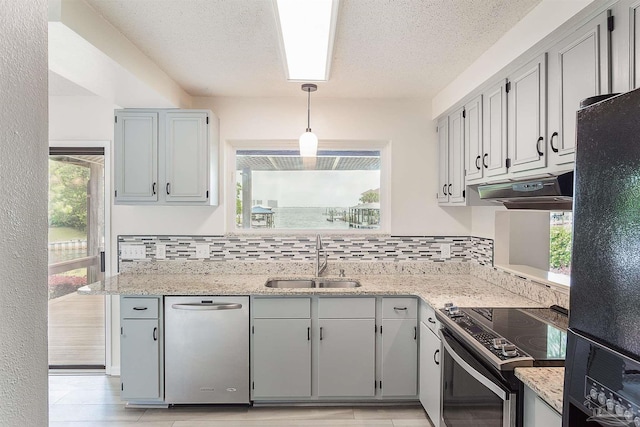 1090 Park Ln, Gulf Breeze, FL 32563 - kitchen featuring electric range, dishwasher, a sink, black fridge, and under cabinet range hood