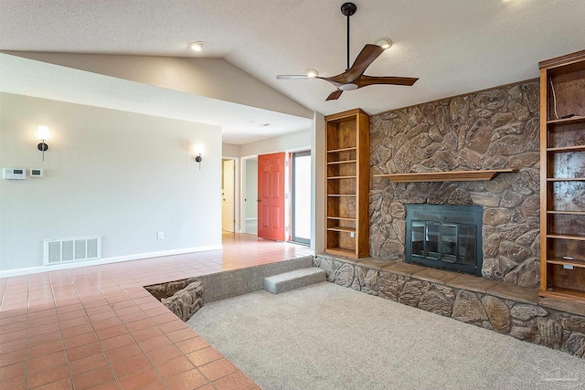 1090 Park Ln, Gulf Breeze, FL 32563 - unfurnished living room with visible vents, baseboards, ceiling fan, built in shelves, and vaulted ceiling