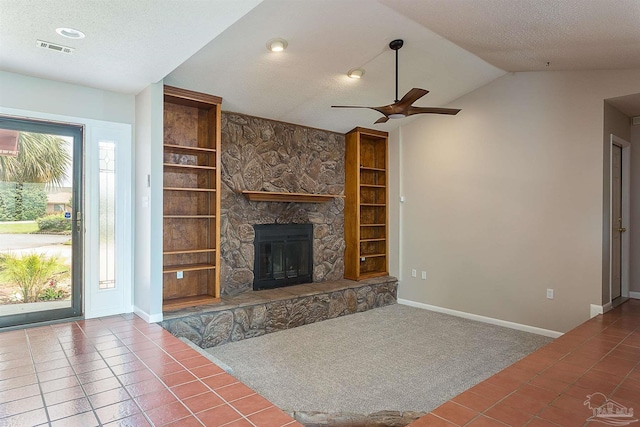 1090 Park Ln, Gulf Breeze, FL 32563 - unfurnished living room with a textured ceiling, tile patterned floors, baseboards, vaulted ceiling, and visible vents