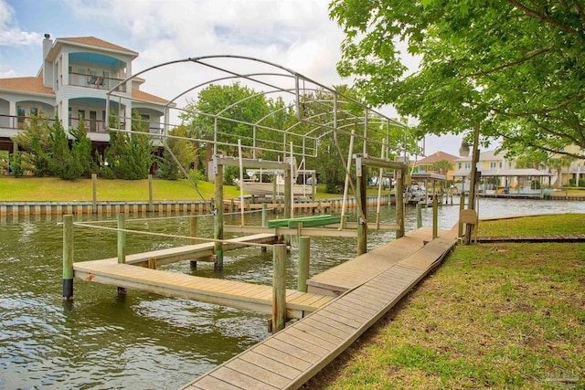 1090 Park Ln, Gulf Breeze, FL 32563 - view of dock featuring boat lift and a water view