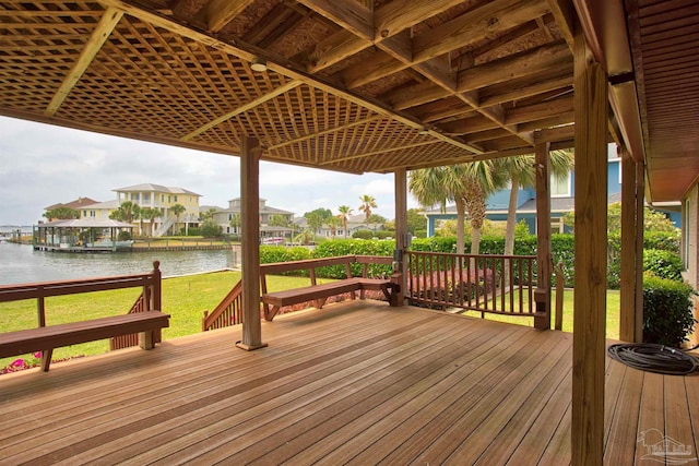 1090 Park Ln, Gulf Breeze, FL 32563 - wooden terrace with a lawn, a water view, and a residential view