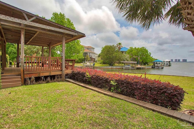 1090 Park Ln, Gulf Breeze, FL 32563 - view of yard with a deck with water view