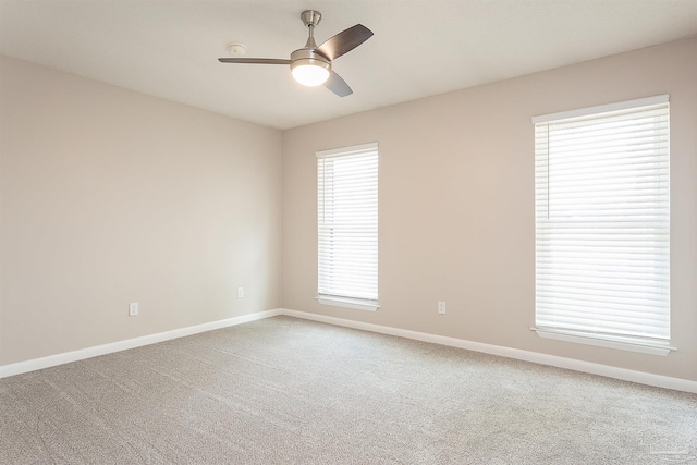 1090 Park Ln, Gulf Breeze, FL 32563 - empty room featuring baseboards, a ceiling fan, and carpet