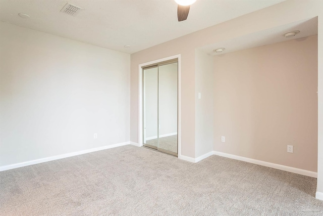 1090 Park Ln, Gulf Breeze, FL 32563 - unfurnished bedroom with baseboards, visible vents, carpet, and a closet