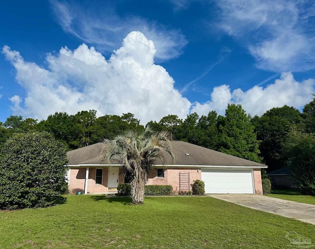 5473 Timber Creek Cir, Pace, FL 32571 - view of front facade with brick siding, concrete driveway, an attached garage, and a front yard