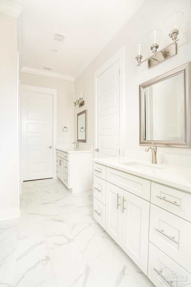 bathroom featuring ornamental molding, tile patterned floors, and dual bowl vanity