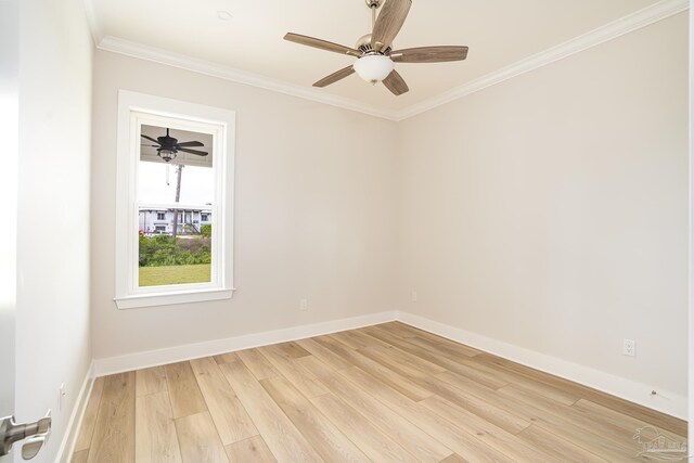 spare room featuring ceiling fan, crown molding, and light hardwood / wood-style flooring