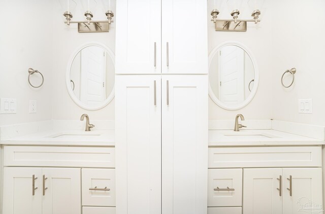 bathroom with double vanity