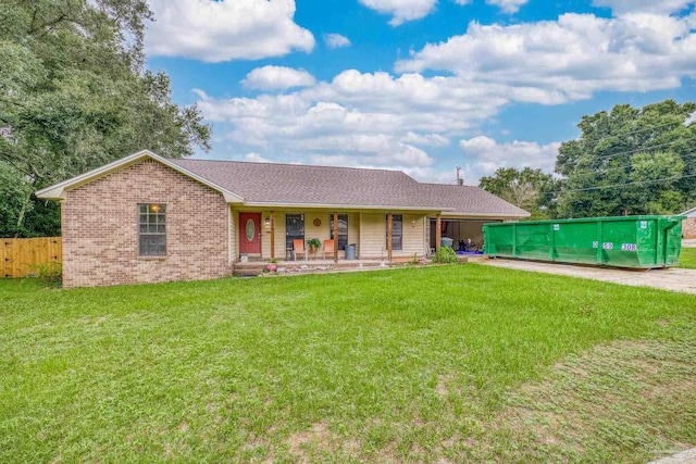 ranch-style house featuring a front lawn