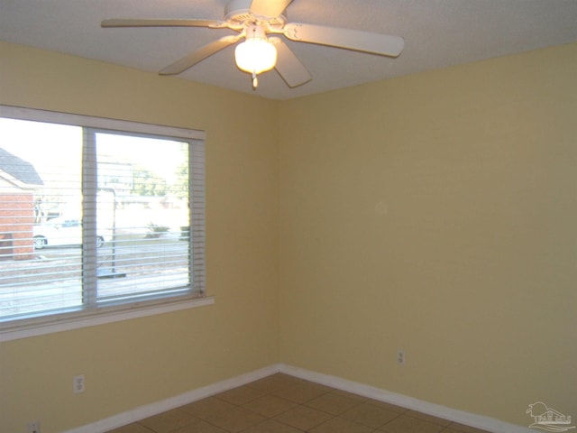 unfurnished room with ceiling fan