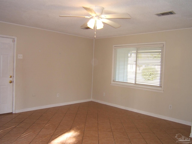 unfurnished room with ceiling fan