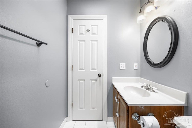 bathroom with vanity and tile patterned floors