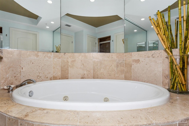 bathroom with a shower with door, toilet, vanity, and ceiling fan