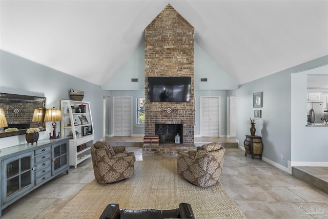 living room featuring high vaulted ceiling and a brick fireplace