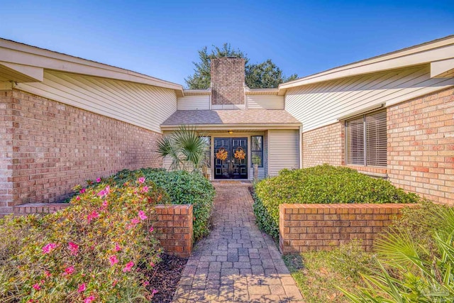 entrance to property featuring french doors