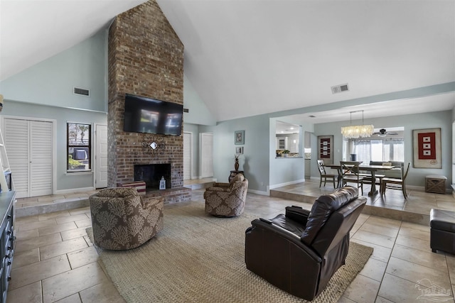 tiled living room with high vaulted ceiling, a brick fireplace, and ceiling fan