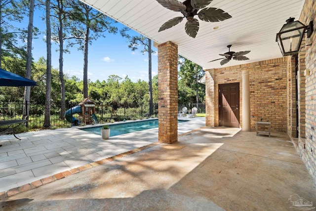 3869 Paradise Bay Dr, Gulf Breeze, FL 32563 - view of swimming pool featuring a ceiling fan and a patio area
