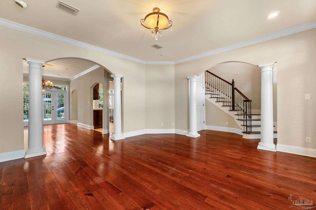 3869 Paradise Bay Dr, Gulf Breeze, FL 32563 - unfurnished living room with hardwood / wood-style flooring, ornamental molding, baseboards, and stairway