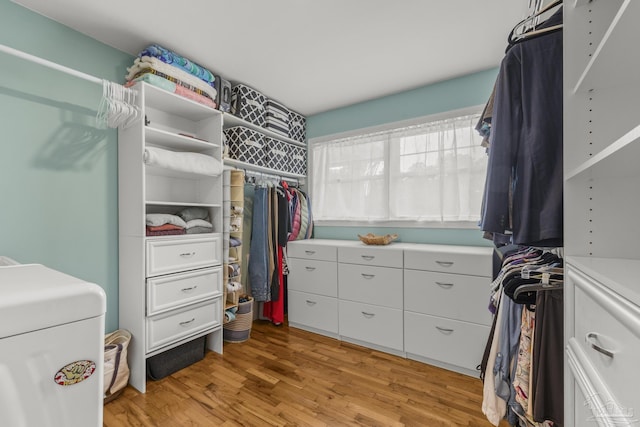 spacious closet with light wood-style flooring