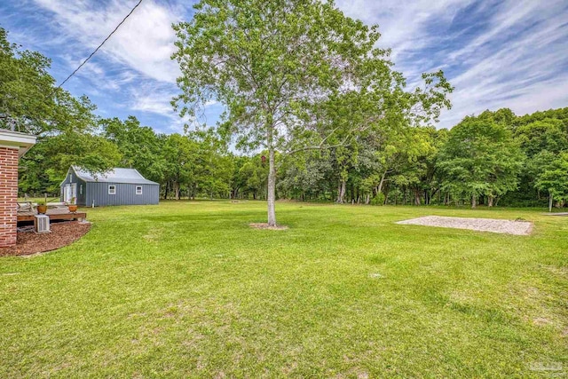 view of yard featuring a wooden deck