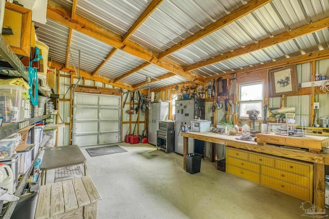 garage featuring a workshop area