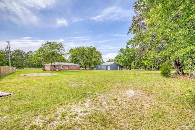 view of yard with fence