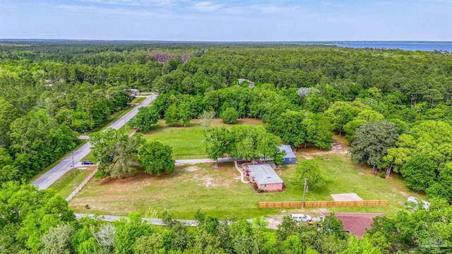 drone / aerial view featuring a forest view