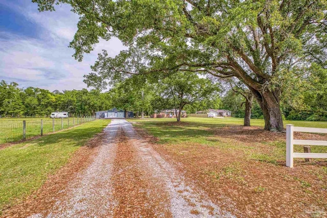 view of road with driveway