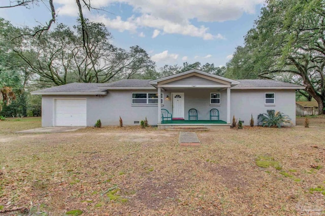 ranch-style house with a garage, a front yard, covered porch, and stucco siding