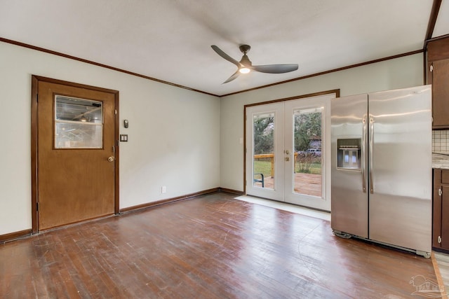 interior space featuring crown molding, a ceiling fan, french doors, and wood finished floors