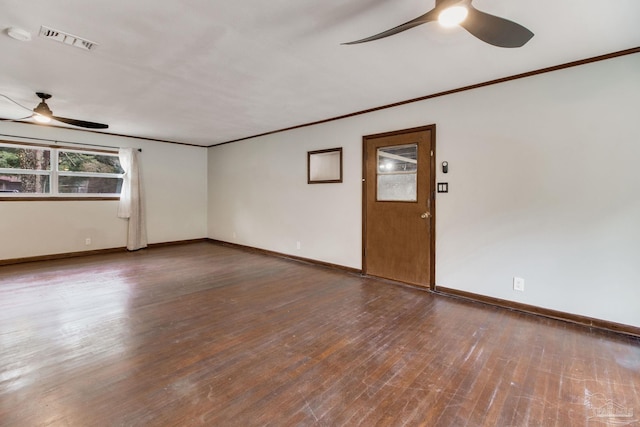 unfurnished room with visible vents, a ceiling fan, baseboards, and crown molding