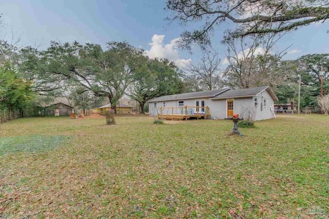 view of yard featuring a deck