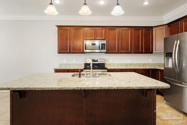 kitchen with crown molding, a breakfast bar area, appliances with stainless steel finishes, and a sink