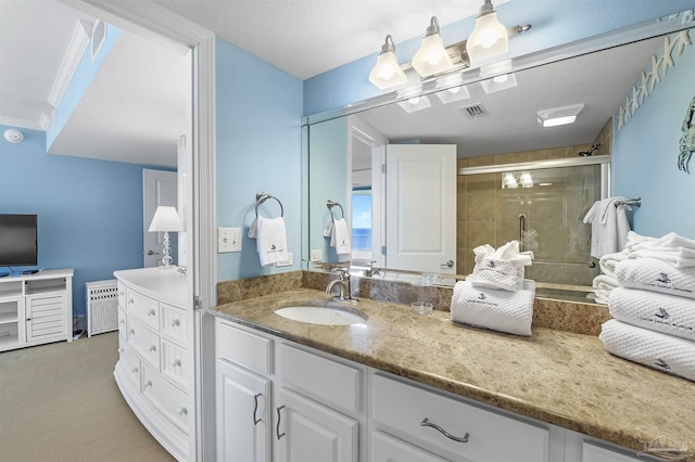 bathroom featuring a shower stall, visible vents, and vanity