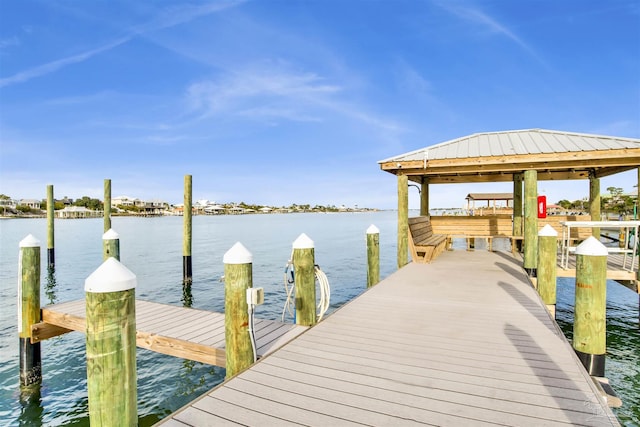 view of dock with a water view