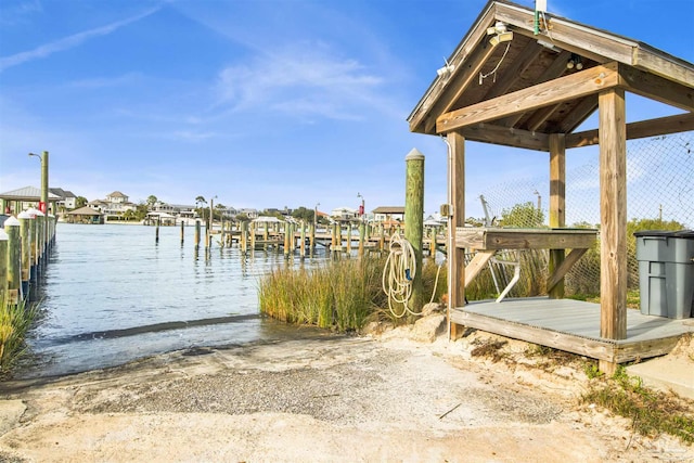 dock area with a water view