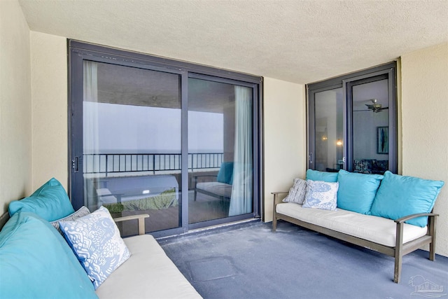 balcony with a patio and an outdoor hangout area