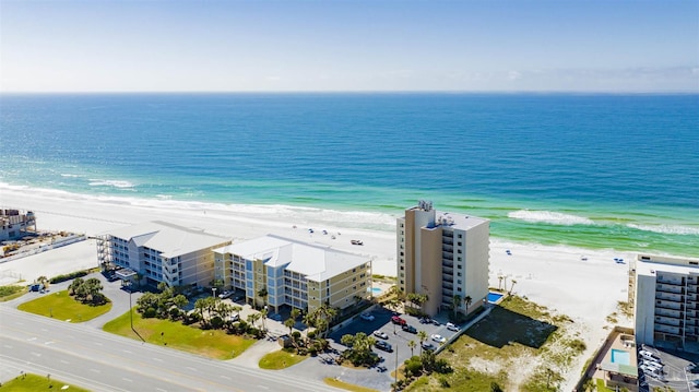 aerial view featuring a view of the beach and a water view