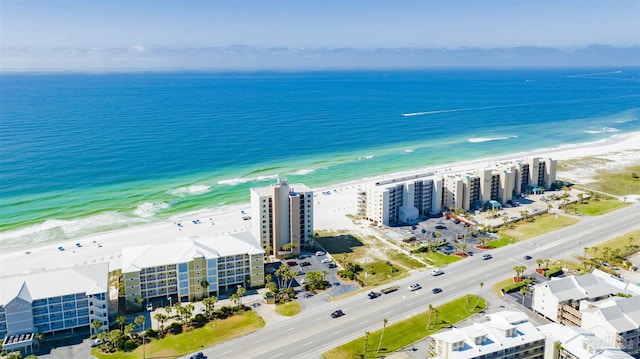 aerial view featuring a water view and a view of the beach