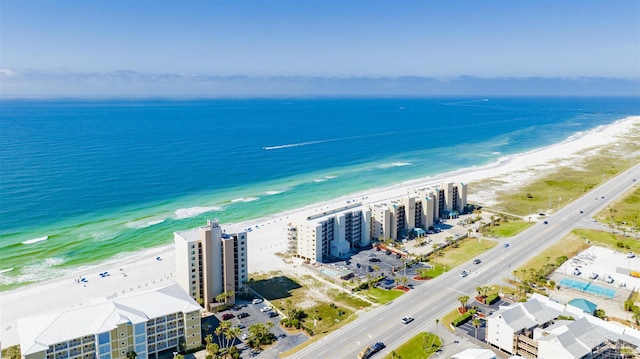 drone / aerial view with a water view and a view of the beach