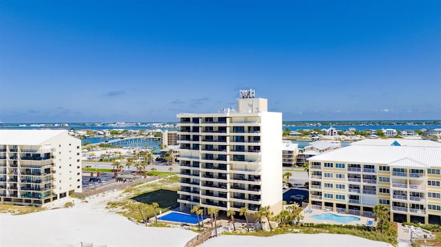 view of building exterior with a water view