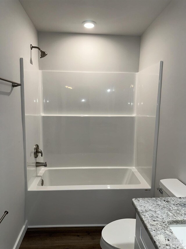 10 Middleton Ln, Atmore, AL 36502 - bathroom with vanity, bathtub / shower combination, toilet, and wood finished floors
